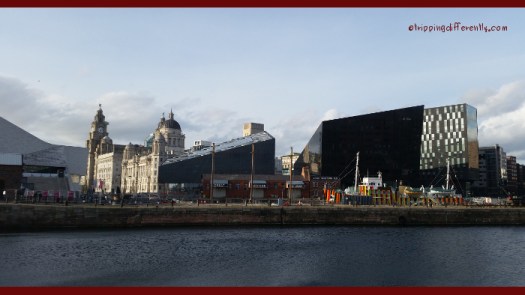 The view from Albert Dock, looking at the Open Eye Museum (the modern building) and the 3 Graces; the Liver Building, the Cunard Building and the Port of Liverpool Building.